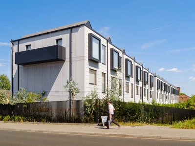 Stunning architectural photography of a housing development, captured by a professional interior design and architectural photographer.