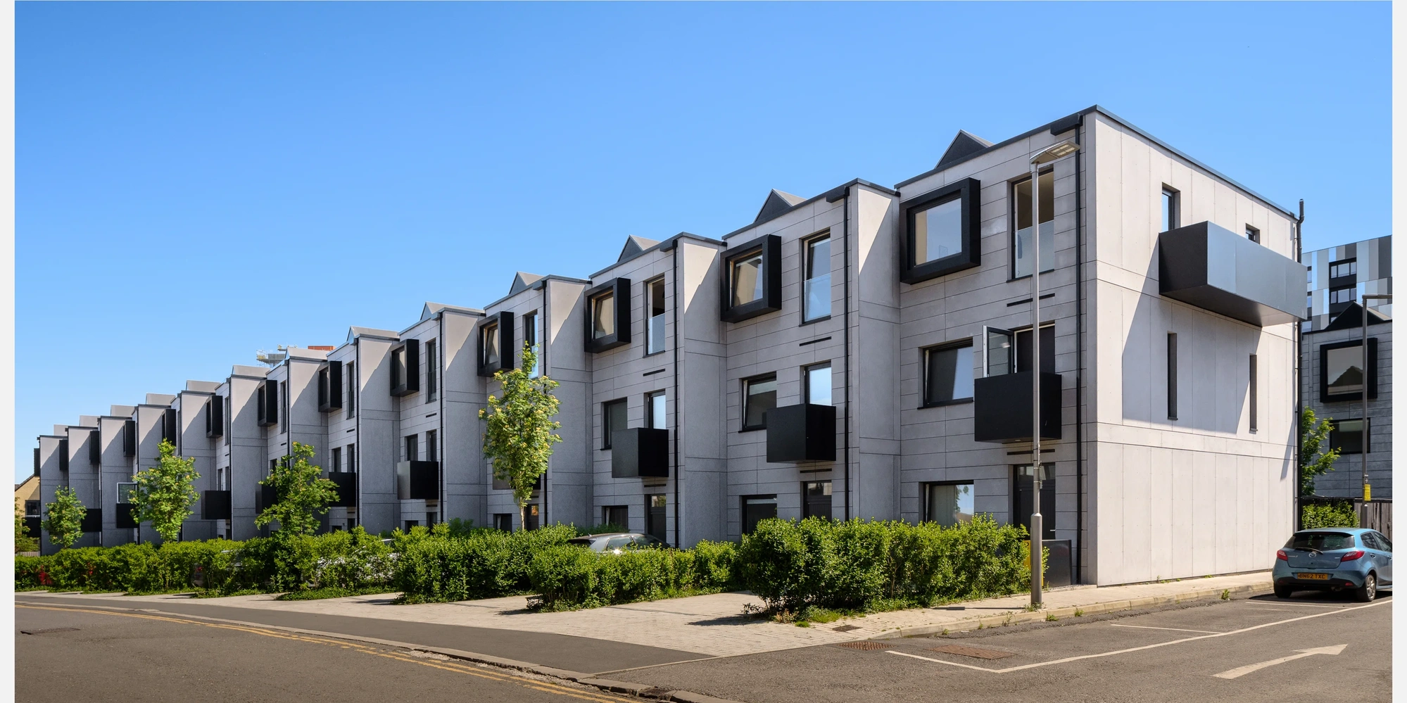 Stunning architectural photography of a housing development project, captured by a professional interior design and architectural photographer.