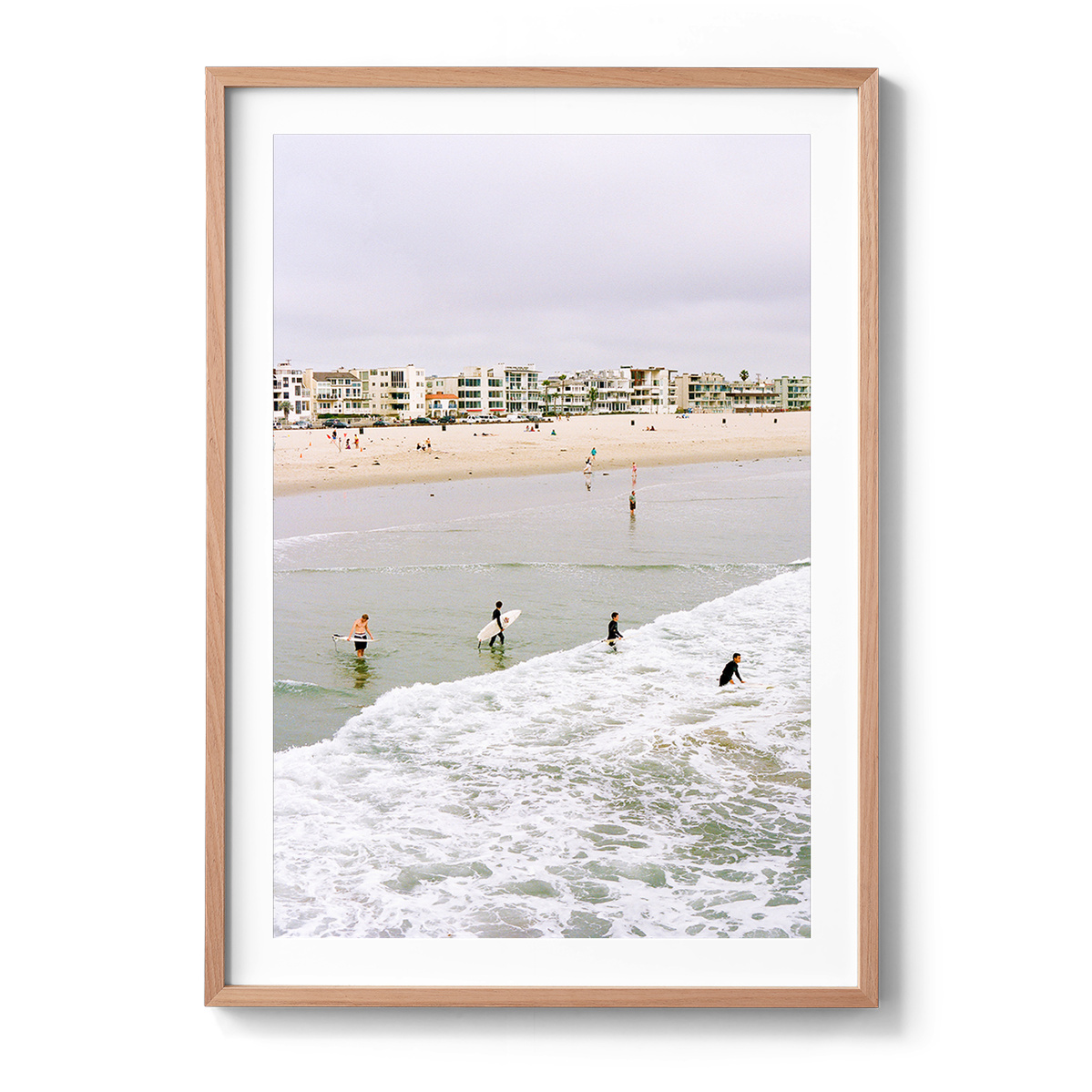 Surfers in Venice Beach. Fine art print framed and ready to hang with natural timber frame.