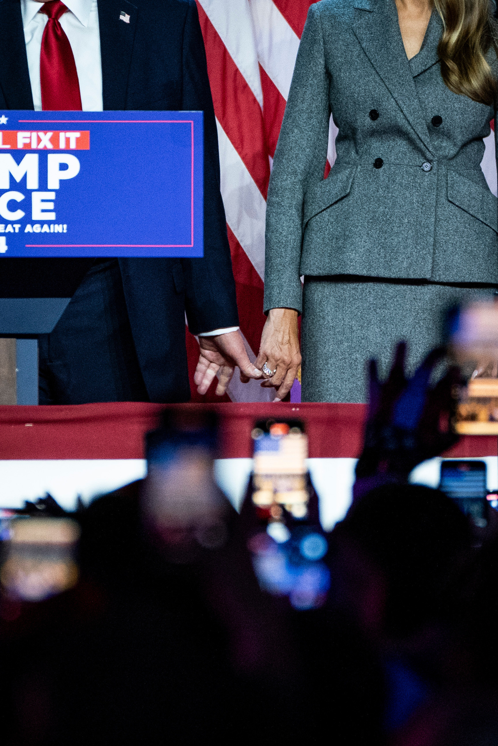 ELECTIONDAY. Former president Donald Trump and former First Lady Melania Trump hold holds as he speaks at an election watch party in West Palm Beach, Florida, on Tuesday, November 5, 2024. (Photo by Haiyun Jiang for The New York Times)