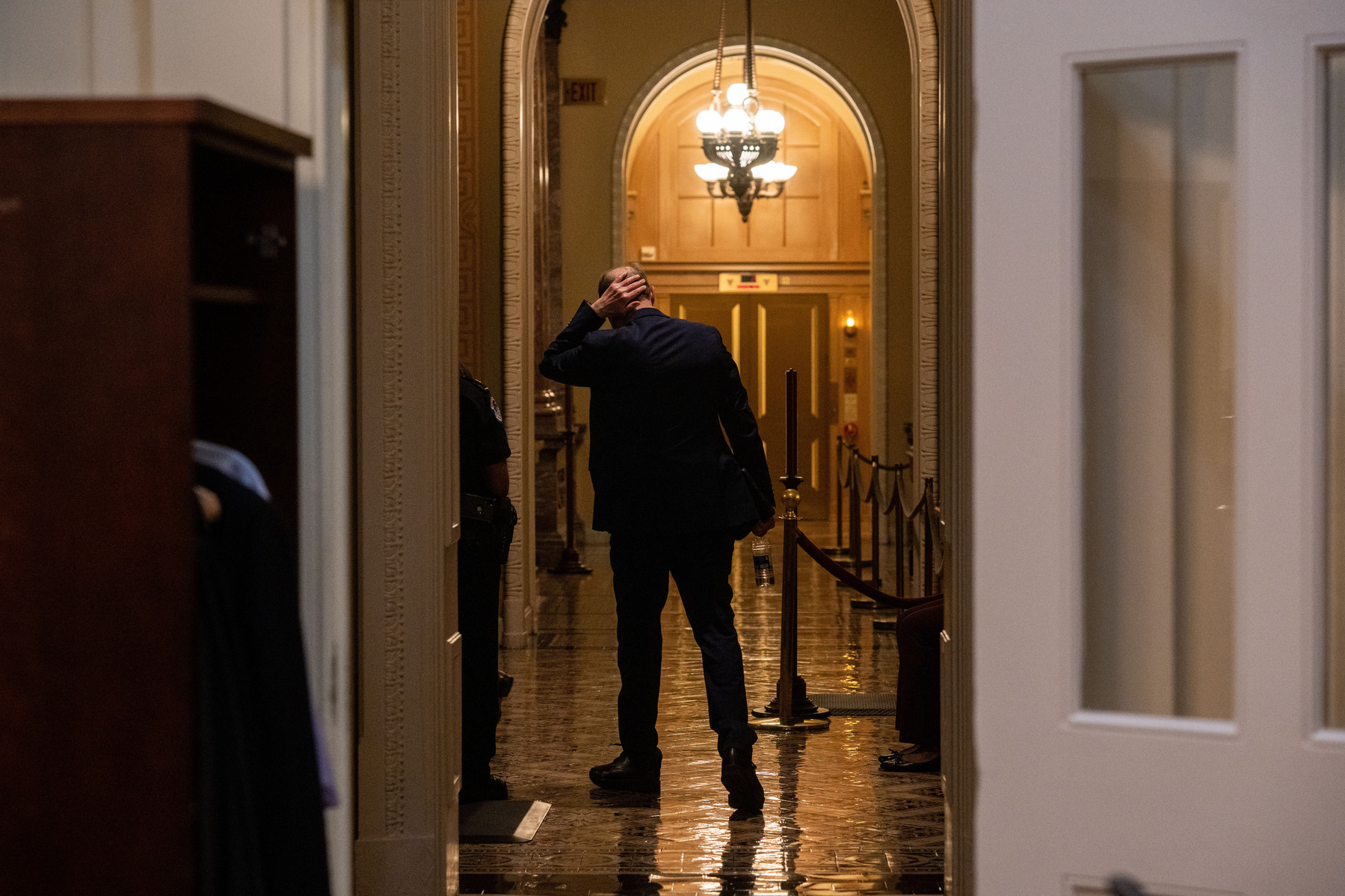 DC-Hill. Sen. Ron Wyden, D-Ore., Chairman of the Senate Finance Committee, leaves after holding a pen and pad presser in the press gallery on Capitol Hill before the “vote a rama” of the Reconciliation bill on Saturday, August 6, 2022. (Photo by Haiyun J