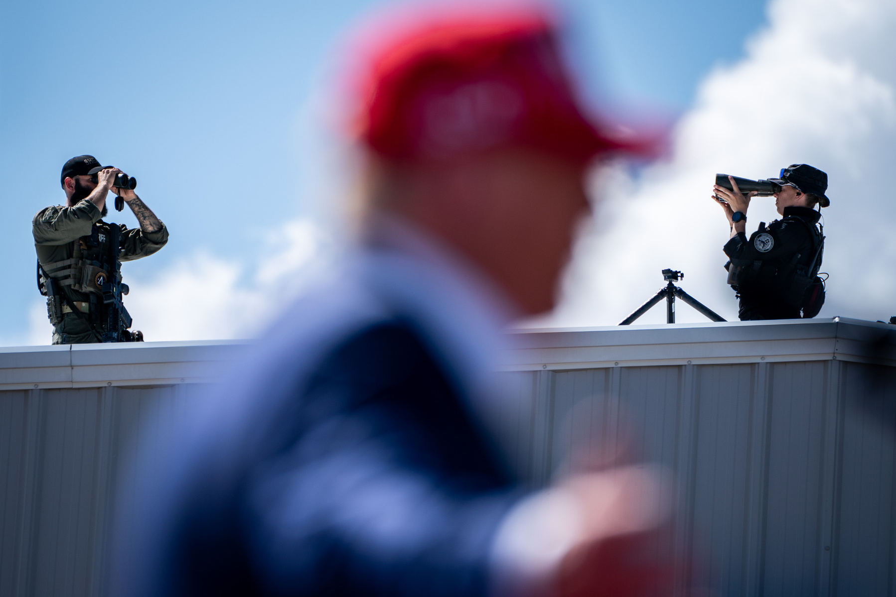 TRUMP. Secret service agents are on the watch as former president Donald Trump holds a rally in Wilmington, North Carolina, on Saturday, September 21, 2024. (Photo by Haiyun Jiang for The New York Times)