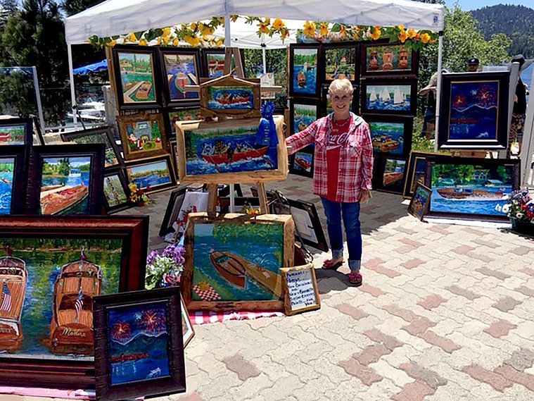 Patty at her stand at Art and Wine festival.