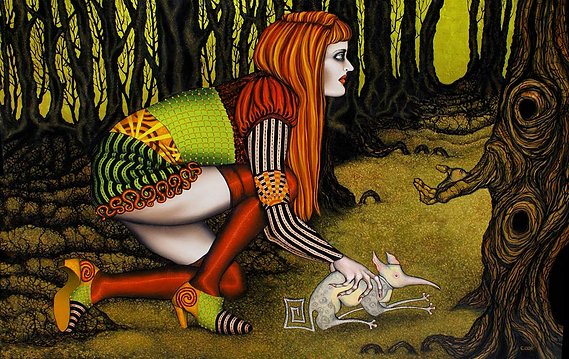 Girl and rat in forest.