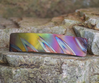 Flame painted copper barrette by Sue Priest yellow pink green and blue