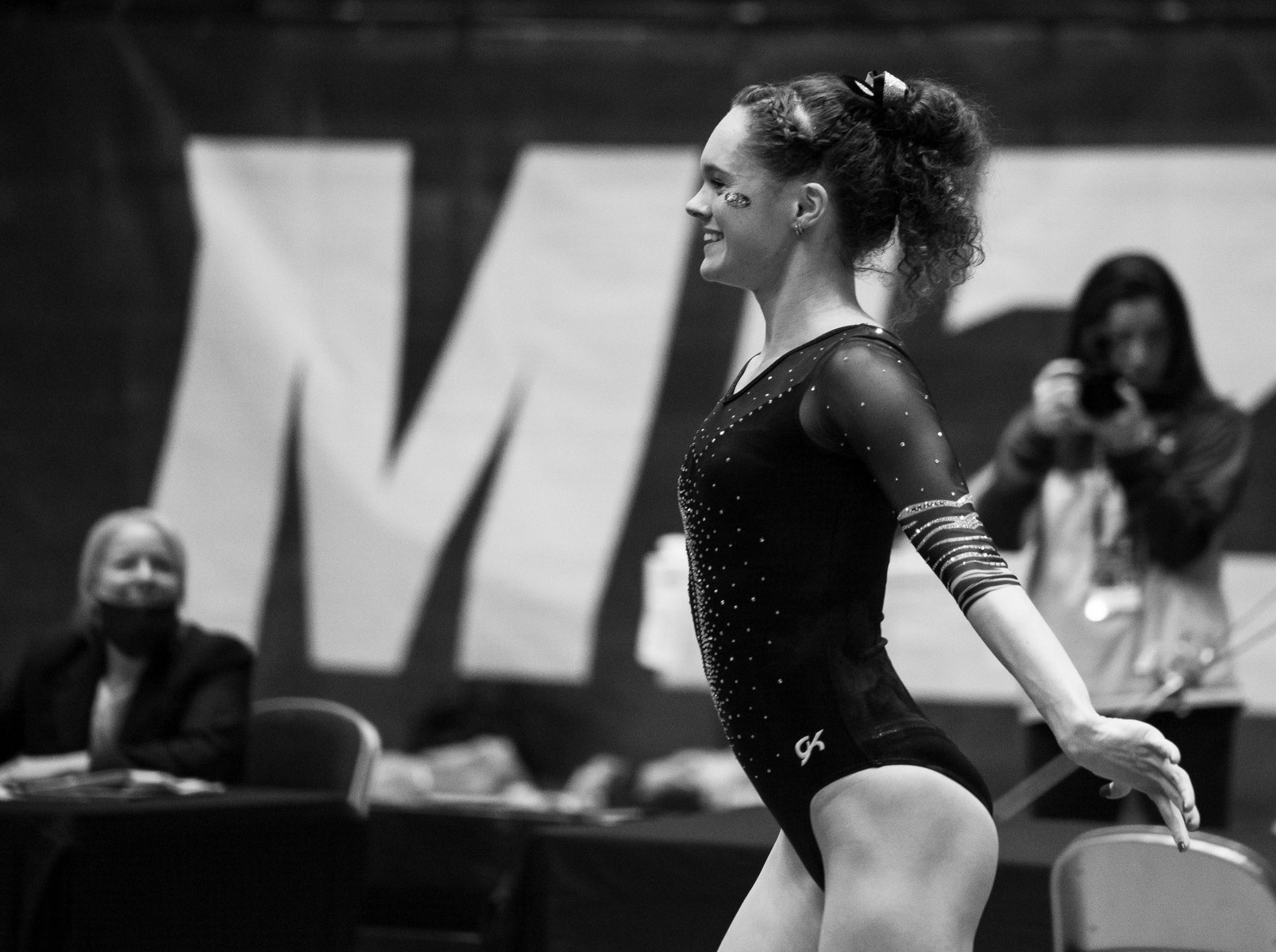 A gymnast performs a floor routine. (Kate Trabalka Photography)