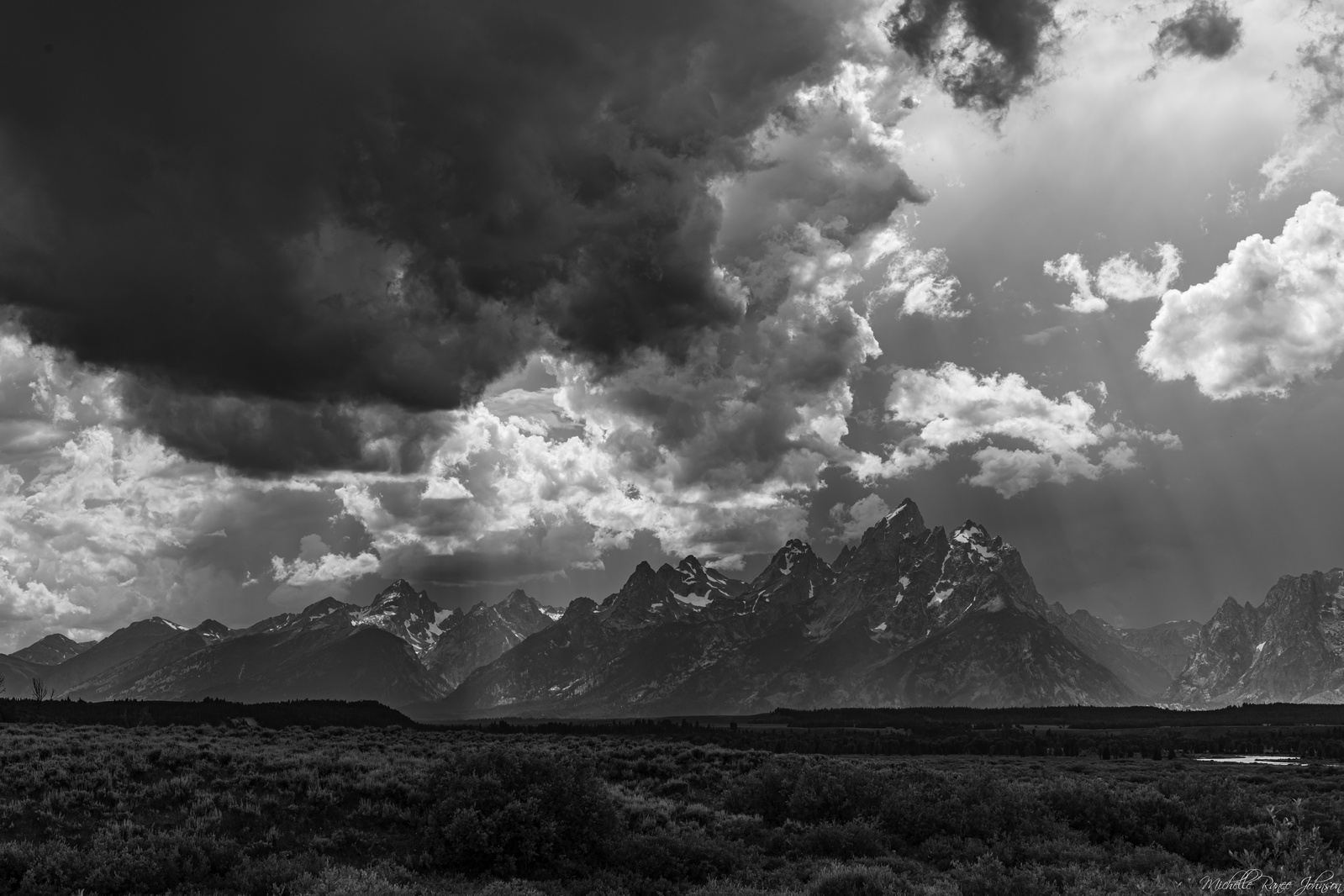 Black and White fine art photo of a thunderstorm over Grand Teton National Park, Wyoming.