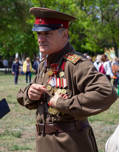 A Russian military veteran shows off his medals at the May 9th 2019 Victory Day ​festivities in Tiraspol, Transnistria, Moldova. Photograph by travel writer and photographer Aidan McMahon.