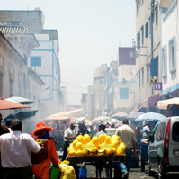 Fruit cart and street scenes in Larache, Morocco. Photograph by travel writer and photographer Aidan McMahon.
