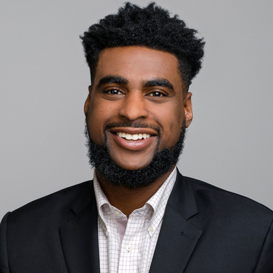 Washington DC headshot makeup artist, portrait of a black man, High quality portrait makeup, professional makeup artist, experienced makeup artist, Natural headshot makeup by Kathleen McAteer, HMUA, MUA, DC Makeup, hairstylist 