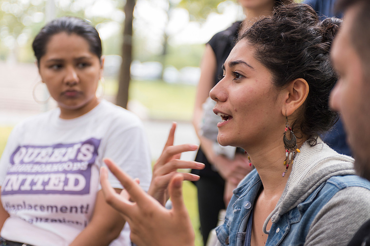 Yessica telling a story about growing up in the neighborhood