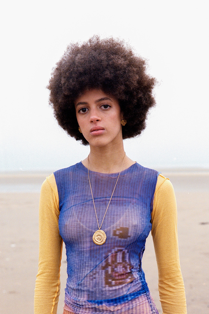 Scarlett Landy medium close-up wearing a LOUISA BALLOU top