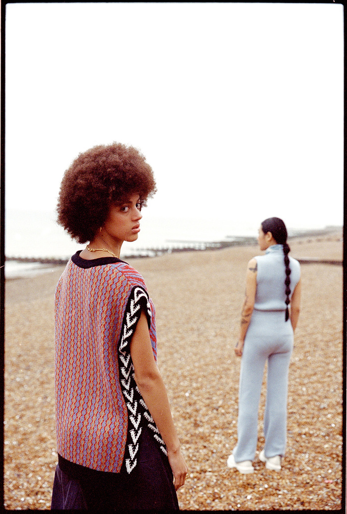 Scarlett Landy and Ruoyi on Hastings pebble beach wearing KNITSS, ST AGN, CARCEL and CLOE CASSANDRO clothing