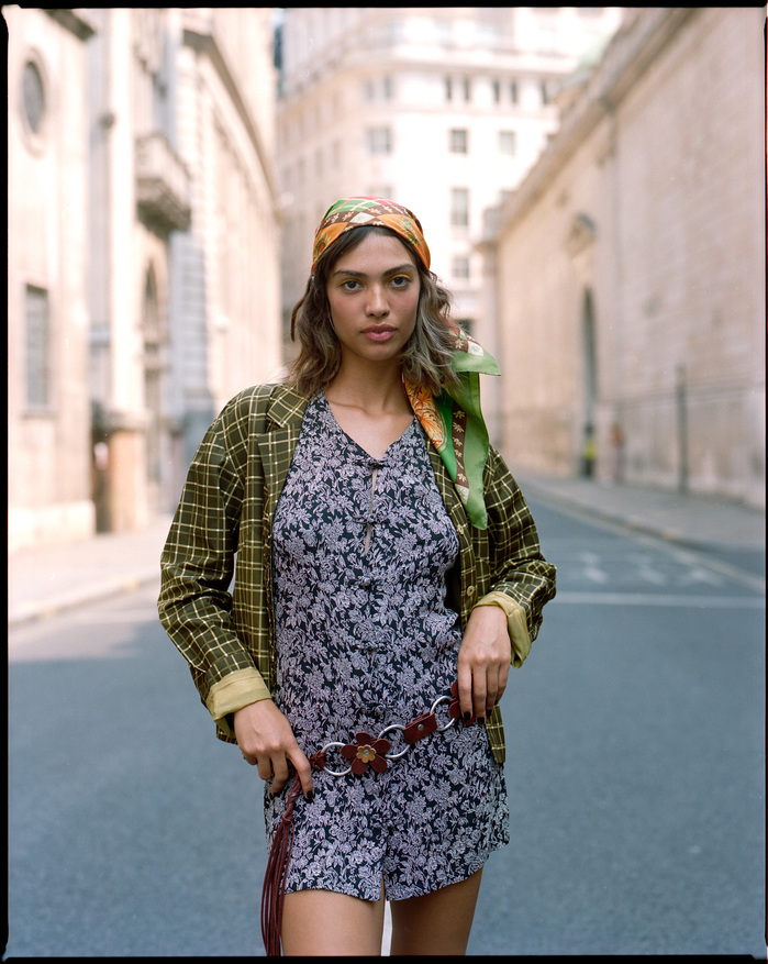 Larissa Diniz wearing vintage dress and and head wrap in Lothbury in City of London
