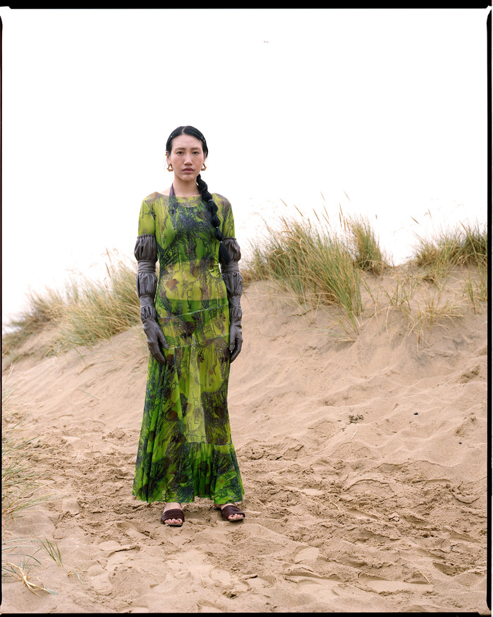 Ruoyi pictured in Camber Sands wearing HILDER YEOMAN, JOANNA LAURA CONSTANTINE earrings and NEOUS shoes