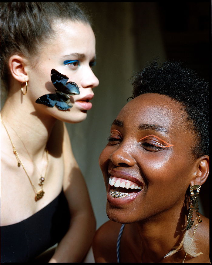 Anna Oloyede and a laughing Mireille B. Welcome lit by afternoon sunshine