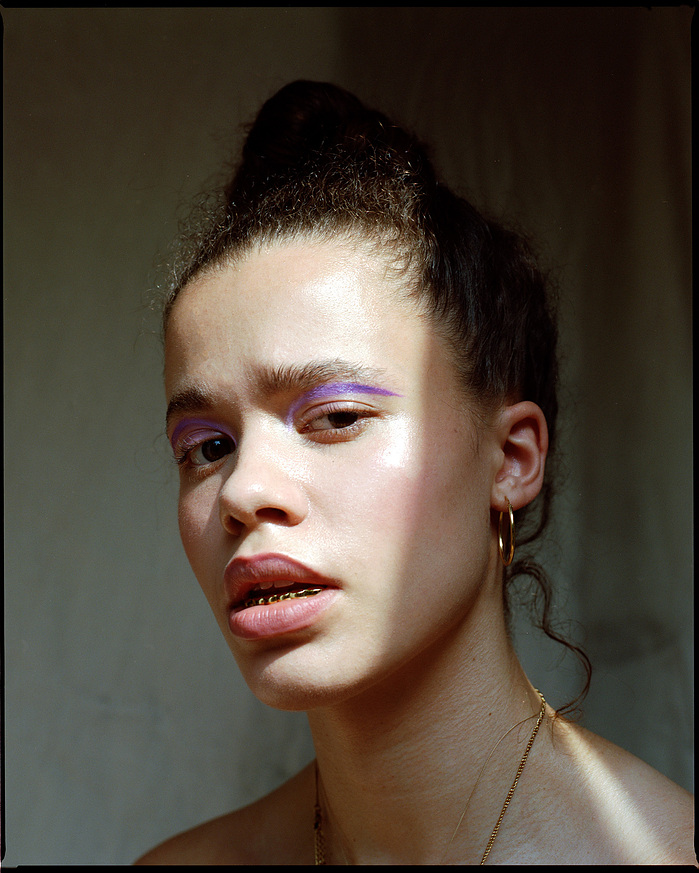 Beauty shot of Anna Oloyede lit by natural sunlight