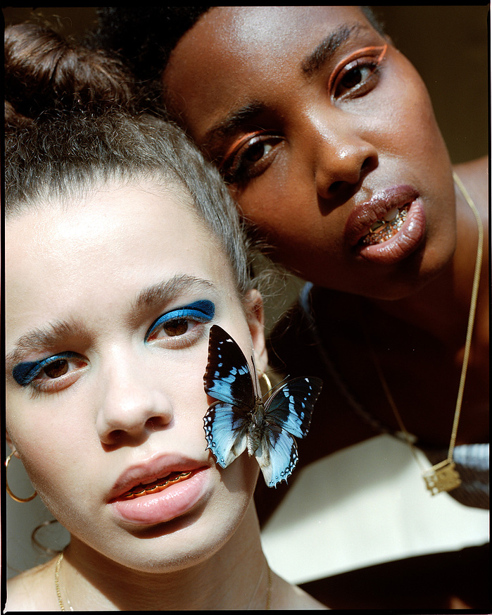 Mireille B. Welcome and Anna Oloyede lit by afternoon sunshine
