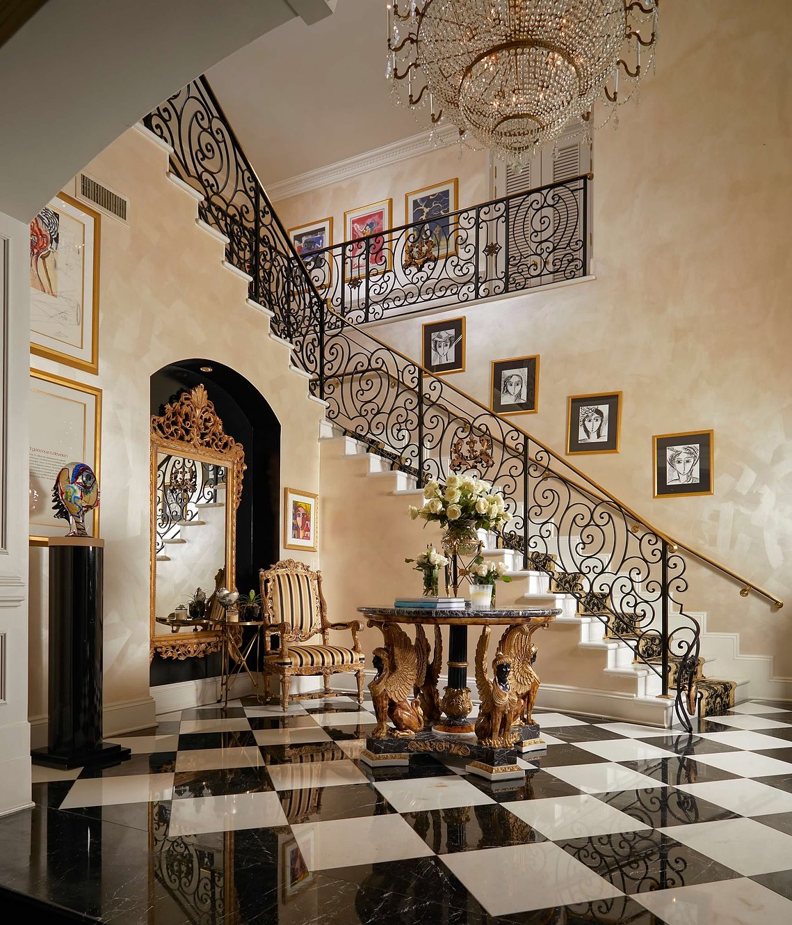 Step into a world of timeless luxury, where black-and-white marble floors meet ornate ironwork. 