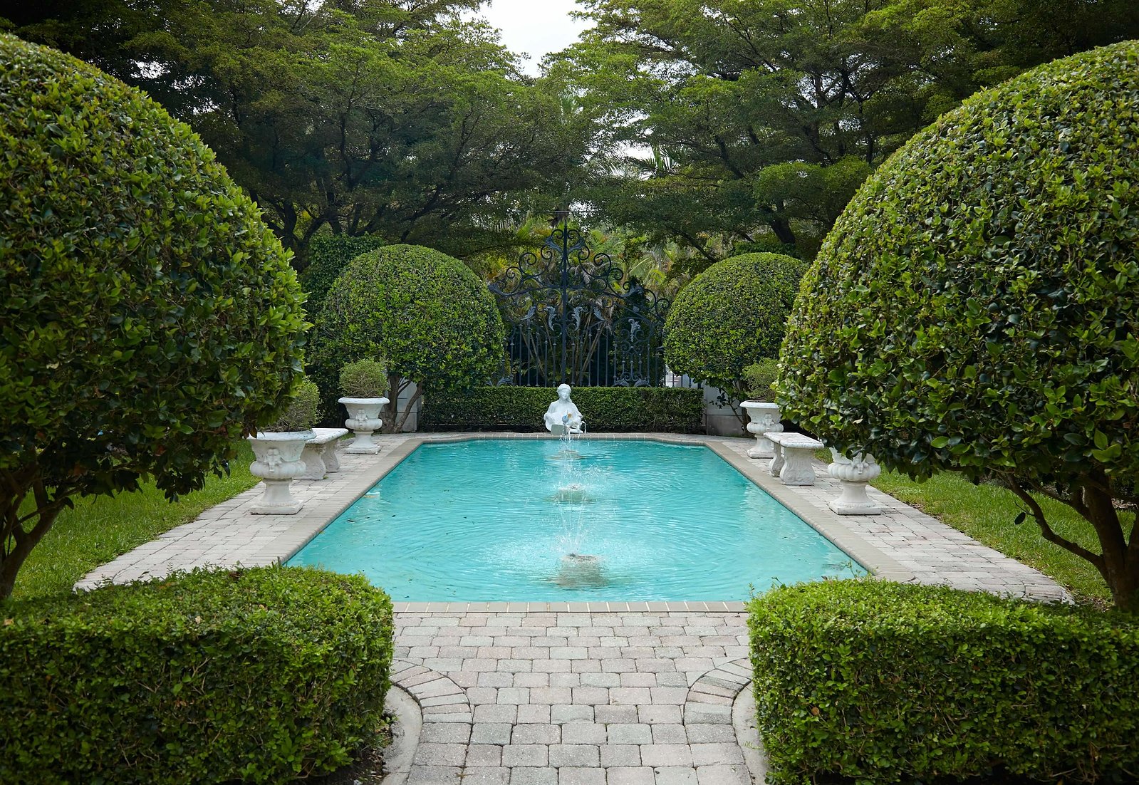 French architectural charm meets tropical beauty in this breathtaking estate