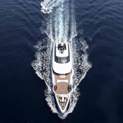 Aerial view from helicopter of a yacht and his annex in Saint-Tropez, South of France.