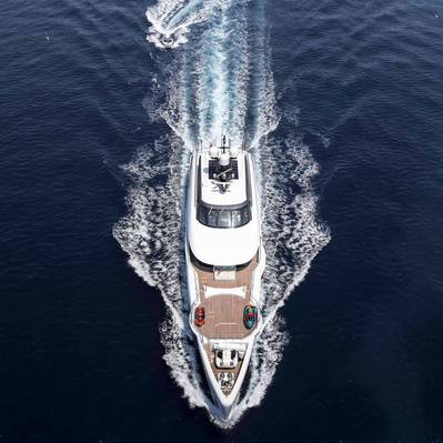Aerial view from helicopter of a yacht and his annex in Saint-Tropez, South of France.
