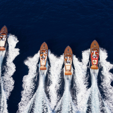 Aerial top view from helicopter of J Craft  yachts aligned near Monaco.