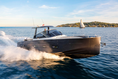 Aerial view from helicopter of a yacht in Saint-Tropez, South of France at sunset with high speed effect.