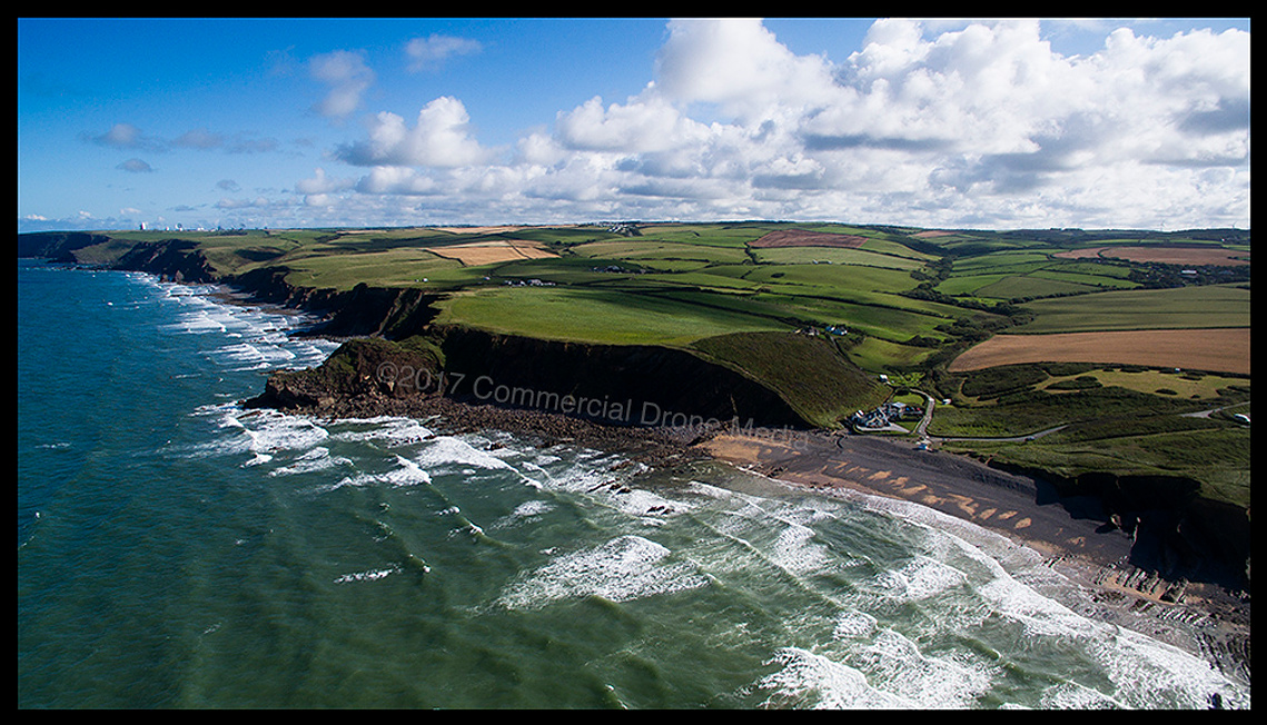 Aerial drone view of Northcott Mouth in Cornwall. UAV photograph for survey, inspection and property sale.