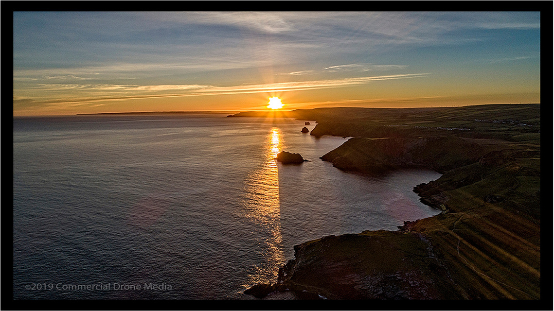 Aerial drone image taken near Tintagel, Cornwall. A sunrise off the North Atlantic Coast near Tintagel. Drones near Bude.