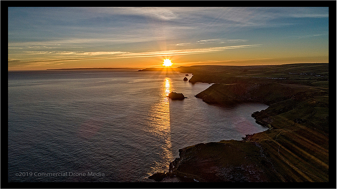 Aerial drone image taken near Tintagel, Cornwall. A sunrise off the North Atlantic Coast near Tintagel. Drones near Bude.