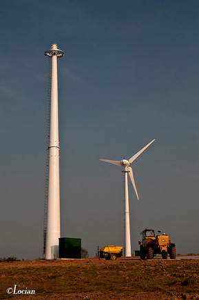 Commercial image of wind turbine being erected, renewables. Photograph depicting wind generated electricity