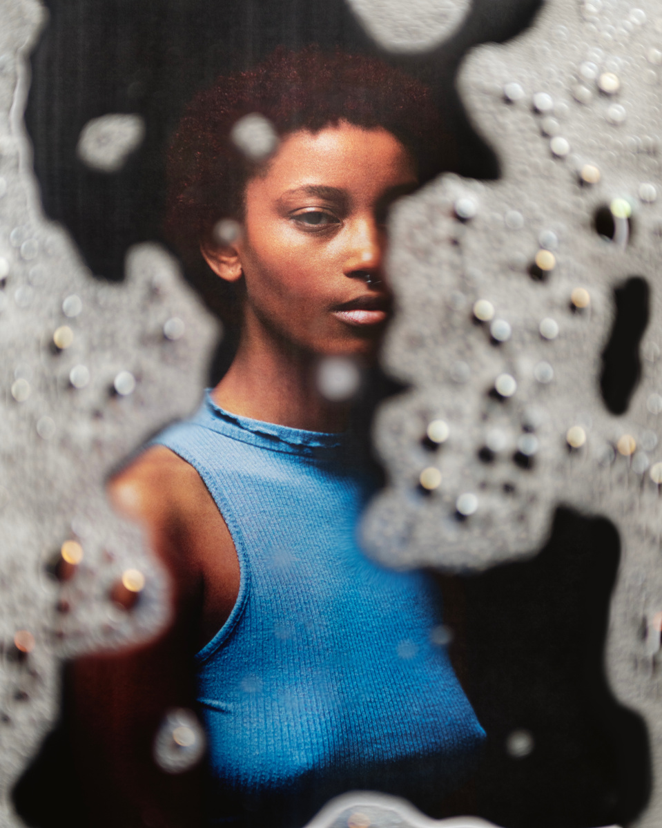 Photograph distorted through soap bubbles by Rielle Oase