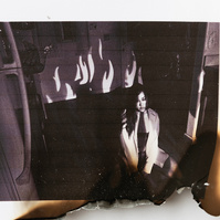 Burned photograph by Rielle Oase