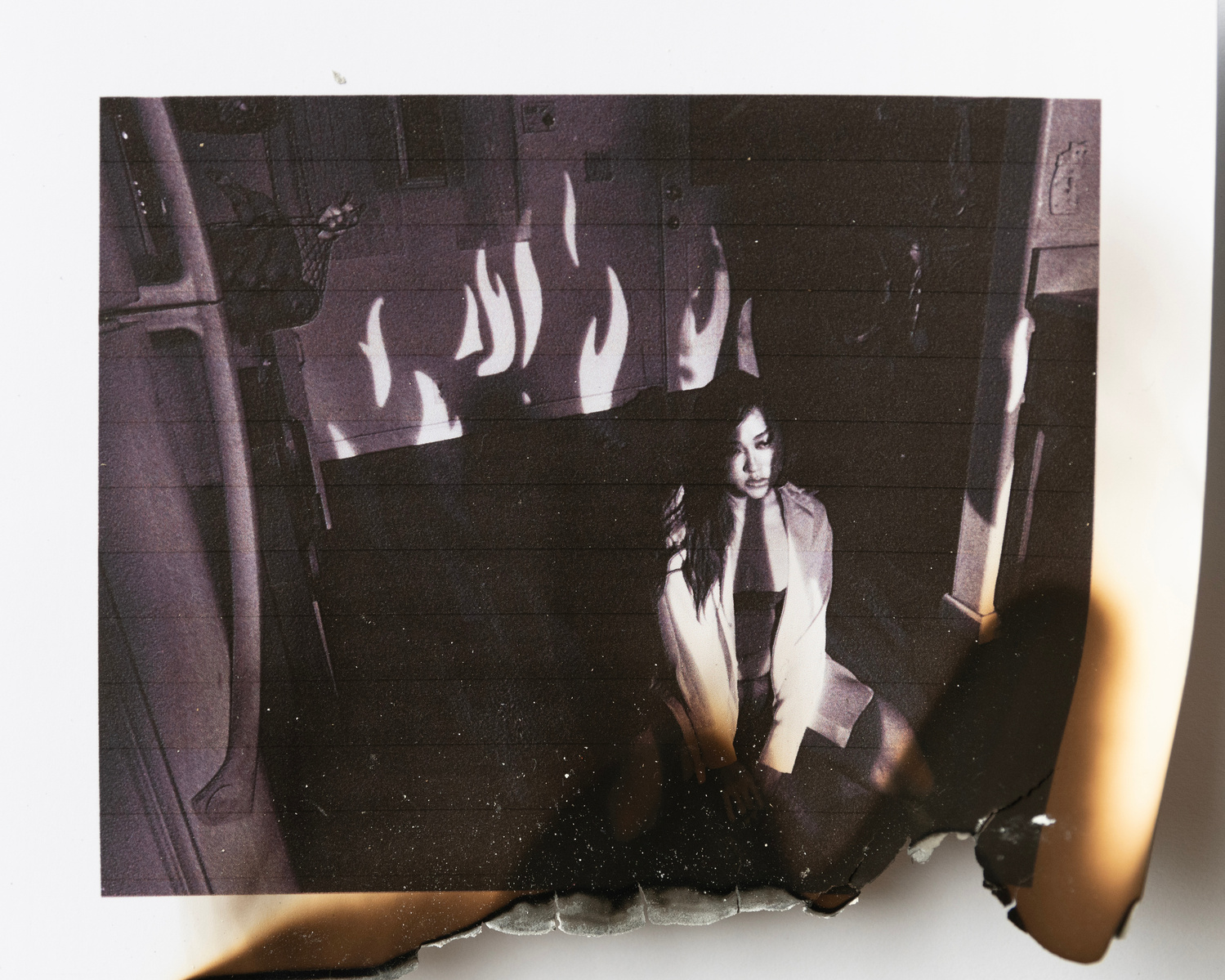 Burned photograph by Rielle Oase
