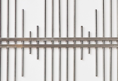 A waveform sculpture made out of rods of stainless steel.