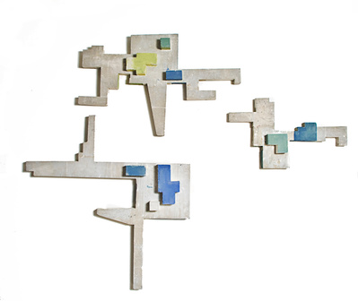 A monochromatic architectonic cubic sculpture made of cast concrete with white plaster that seems to grow organically with a bit of color