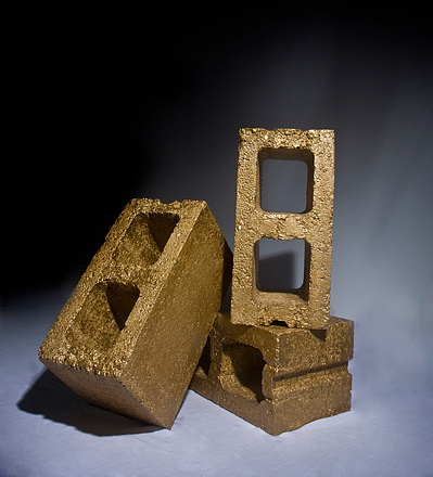 Gold painted breeze blocks, piled up against each other