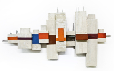 An architectonic cubic sculpture made of cast concrete. Stainless steel is part of the construction.