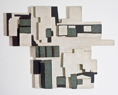 A sculpture of cubic concrete roof tops with tar and protective membrane