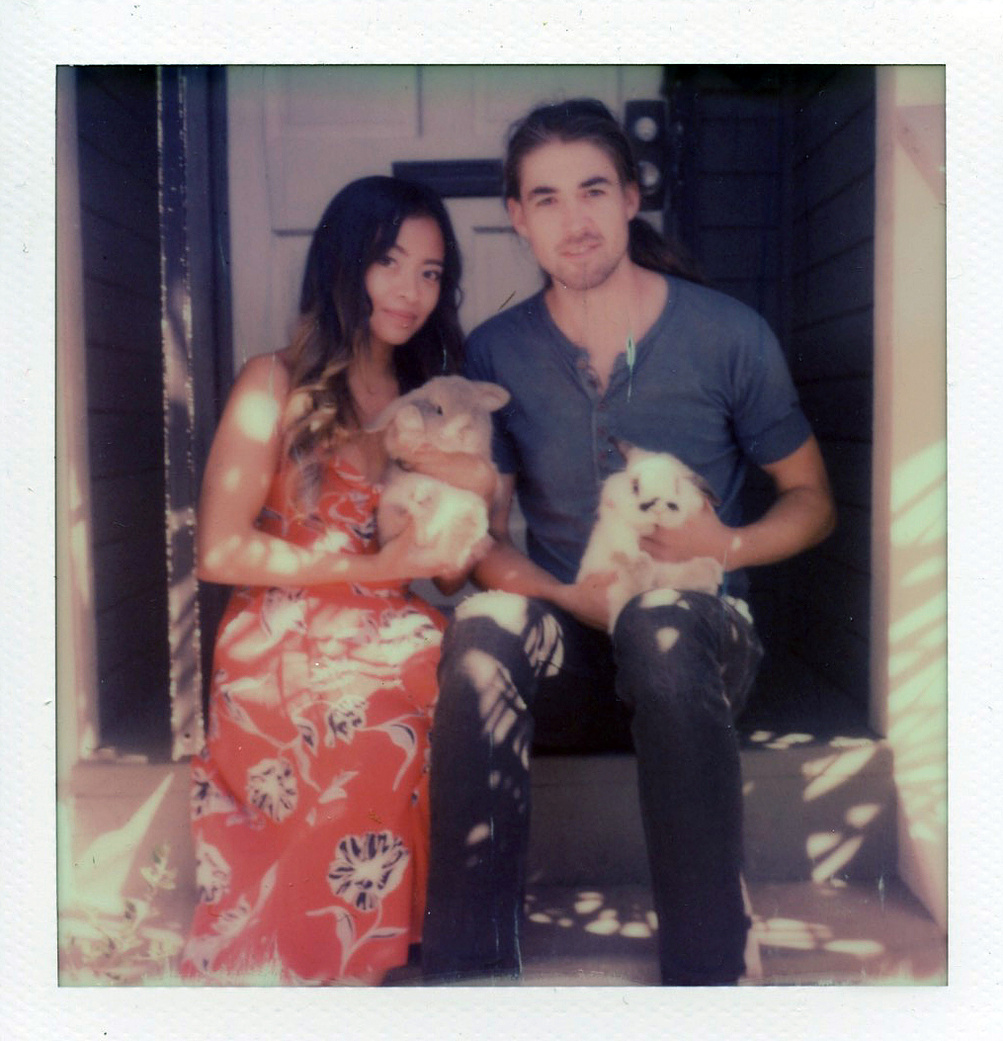 Stephen Paul and Clarisse with their bunnies Peanut and Dixie