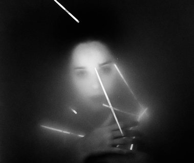 Artistic underwater glow stick photography project with dancer and choreographer Anima May, Berlin Germany
