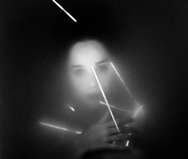 Artistic underwater glow stick photography project with dancer and choreographer Anima May, Berlin Germany