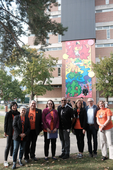 Wilfrid Laurier University President and Vice-Chancellor, Deborah MacLatchy poses with Laurier staff, Laurier board members and Mayor Dorothy McCabe.