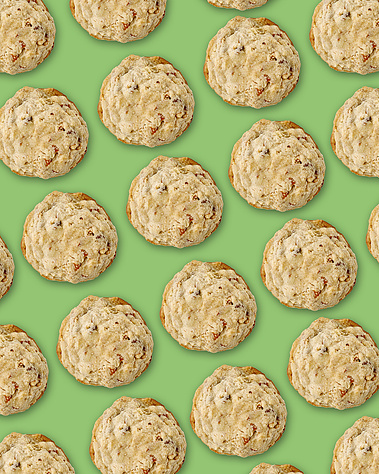 Halva and pretzel cookies repeating in diagonal lines across the frame. Yellow-green  background. Image shot by Megan Morello, San Diego and Southern California Food and Photographer.