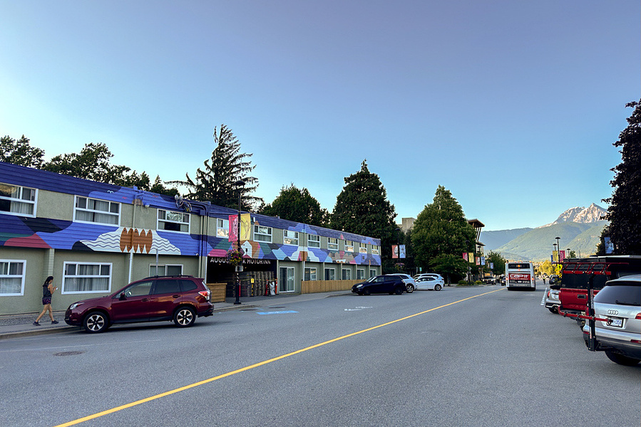 A photo of August Jack Motor Inn and the street view in downtown Squamish.
