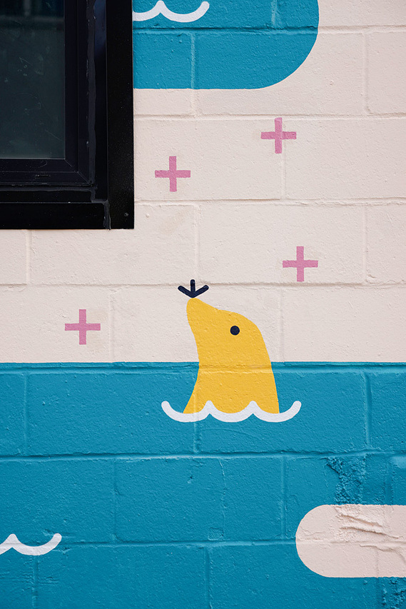 A close-up of the seal in Annie Chen's Sea to Sky mural in East Vancouver.