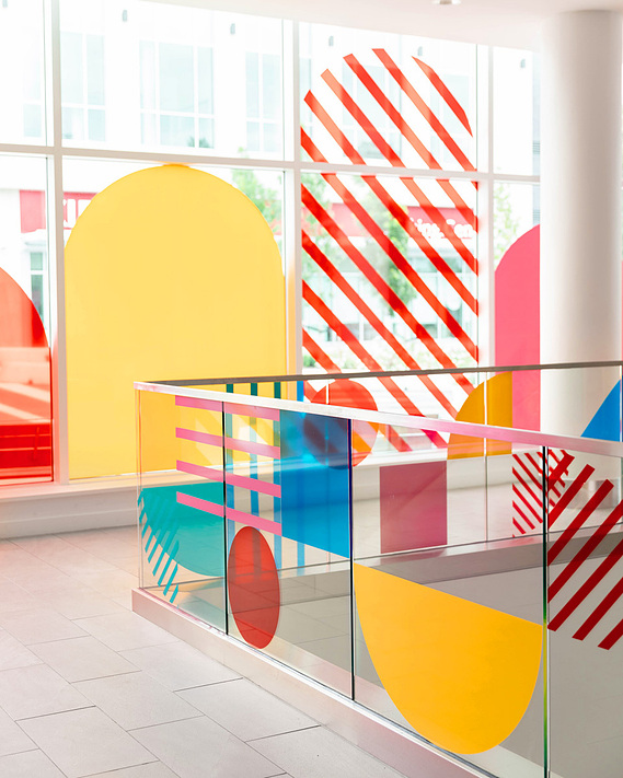 A vibrant vinyl installation featuring colorful geometric designs by Annie Chen.