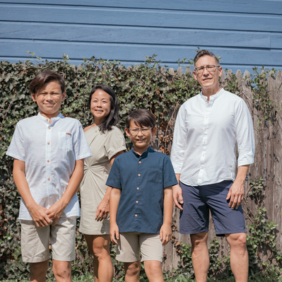 Gathered in a sunny park, this beautiful family posed for their photo session. Laughter filled the air as they shared candid moments and loving embraces. With radiant smiles and playful energy, they captured the beauty of their unbreakable bond.