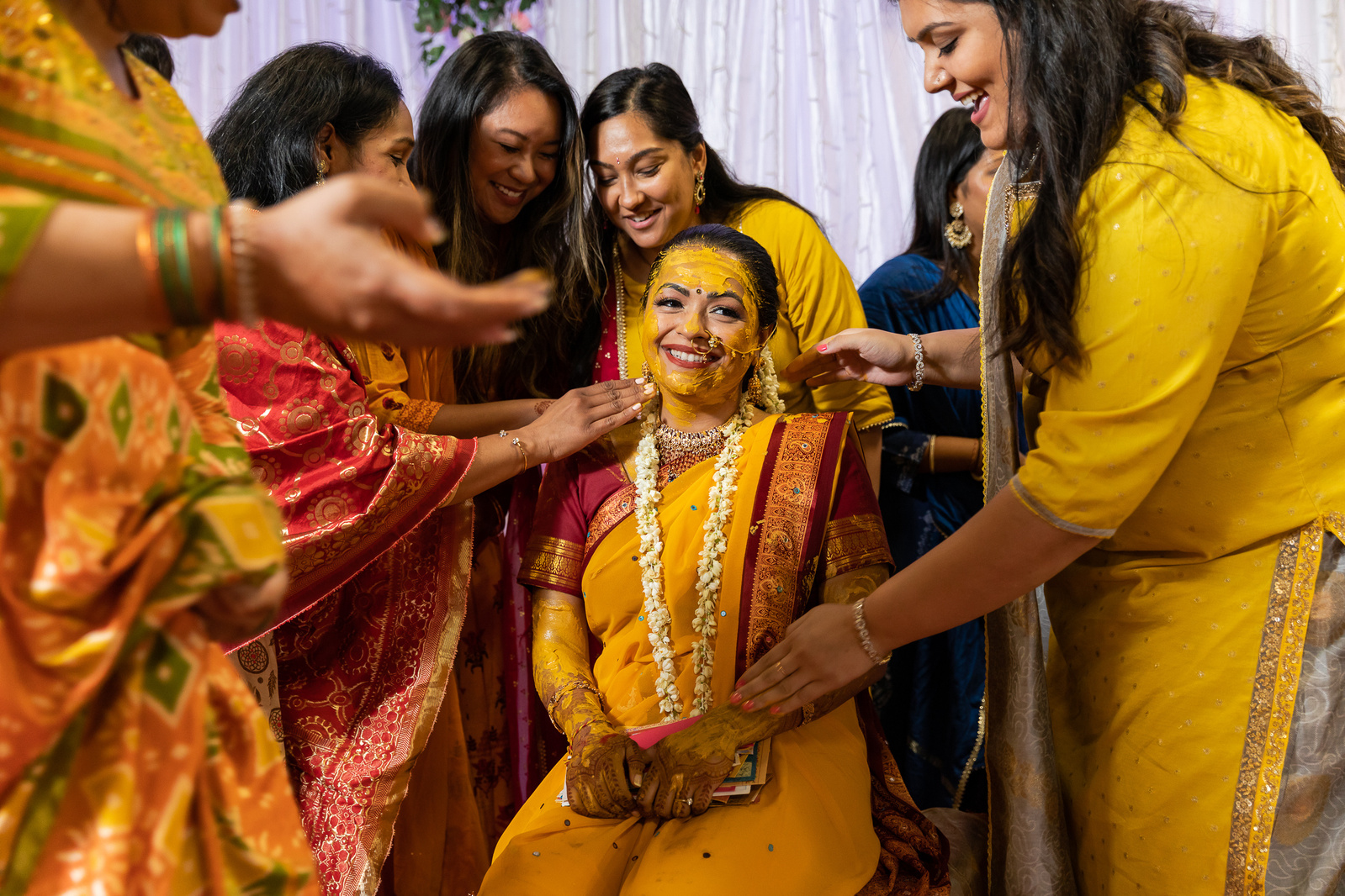 Bride celebrating haldi ceremony